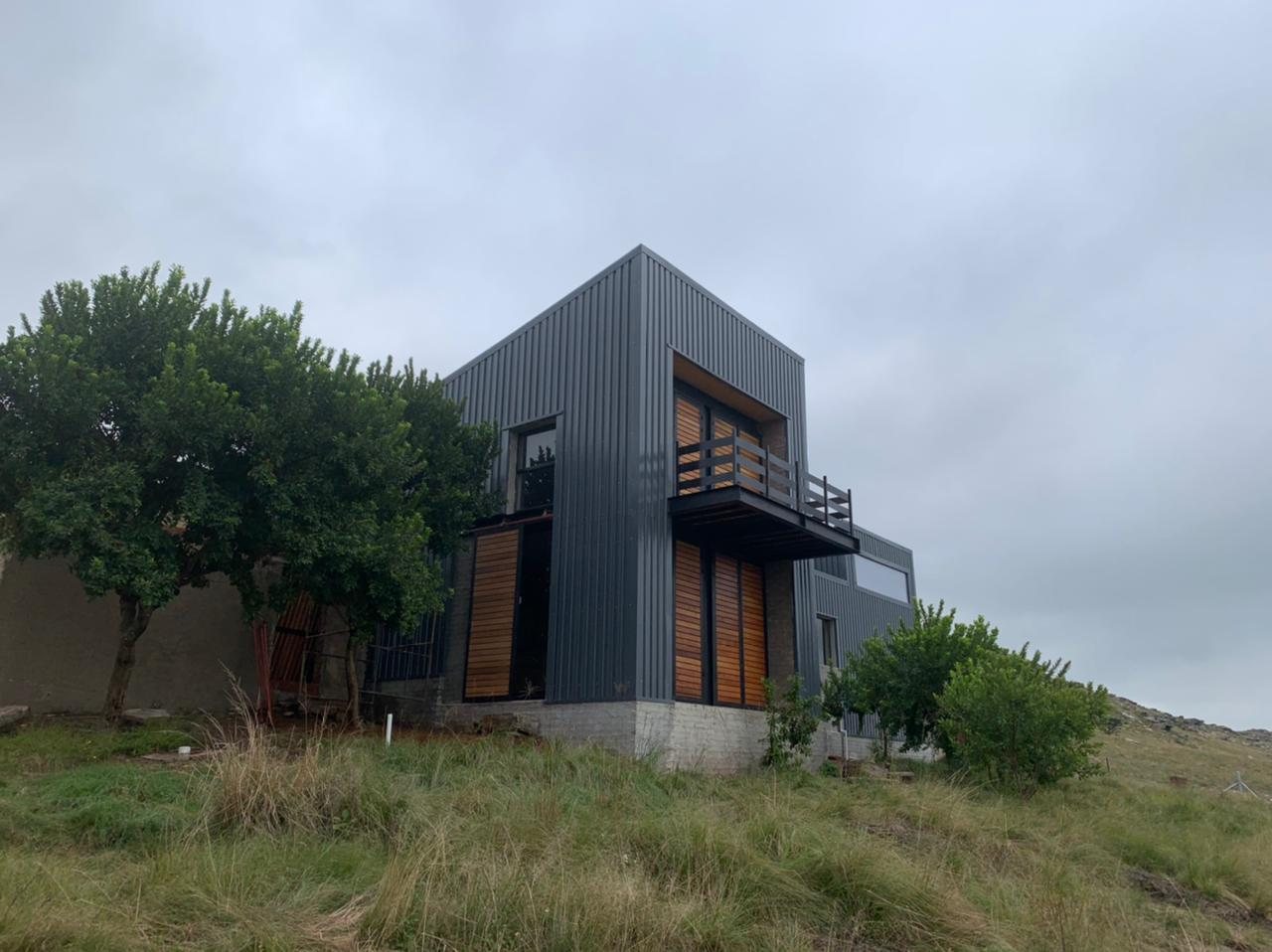 Bergplaas — steel-clad house on the mountain