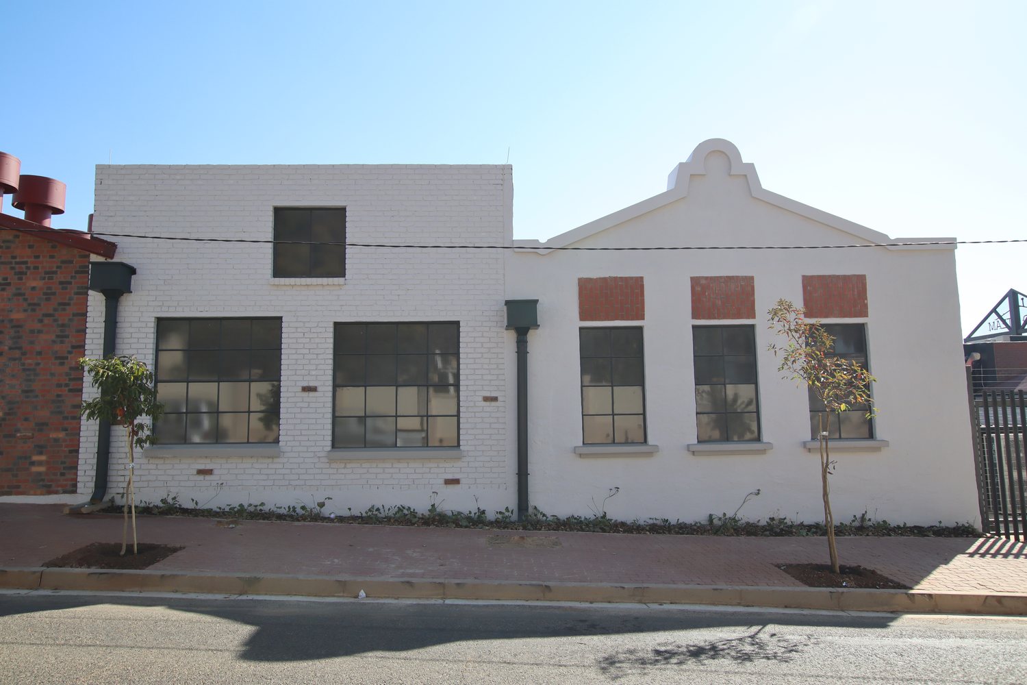 The reconstructed gabled laundry building